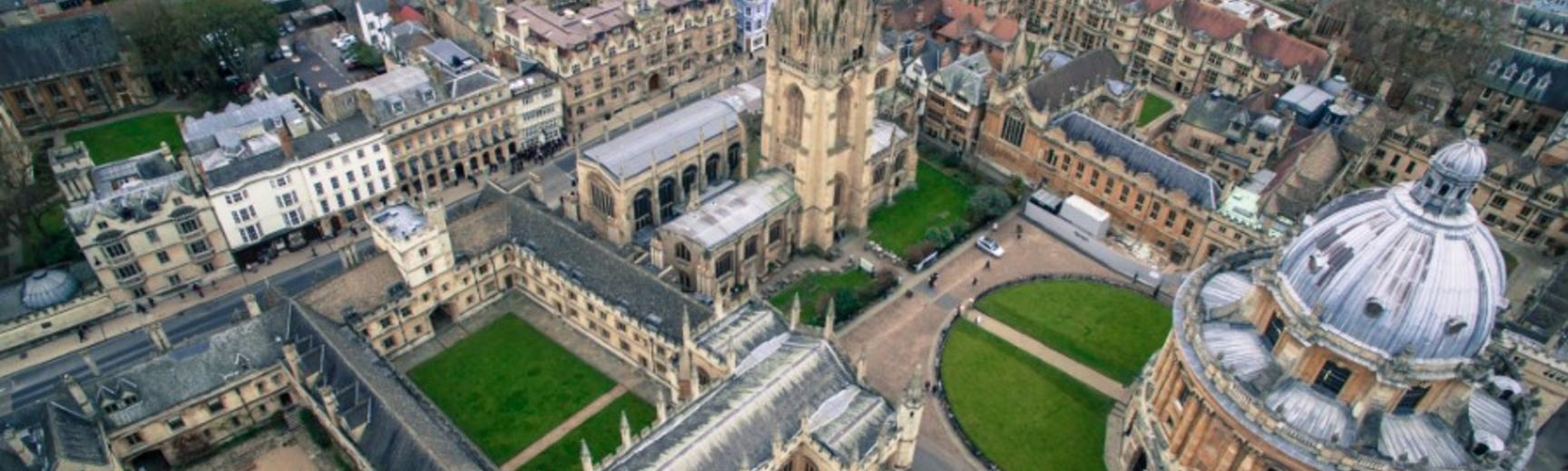 Aerial view of Oxford depicting colleges and green lawns